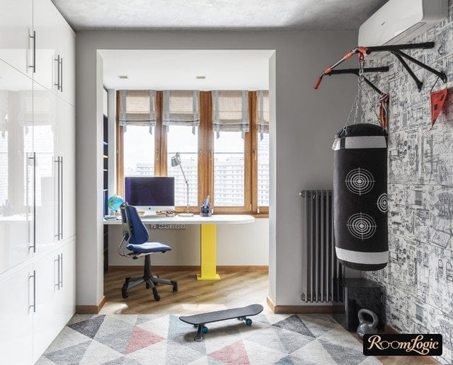 a boxer's punching bag in a boy's teenager room
