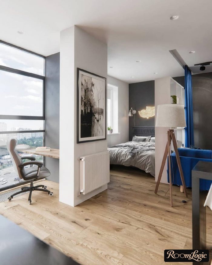 a contemporary studio with a Scandinavian-style balcony