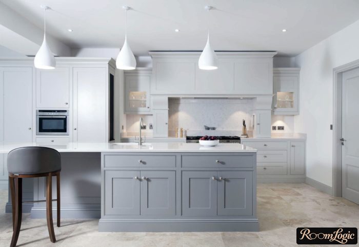 a gray kitchen up to the ceiling in neoclassical style