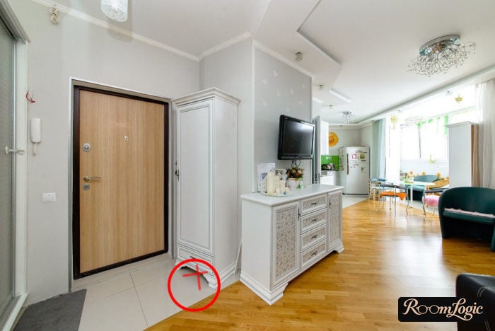 a legged classical style wardrobe in the entry area