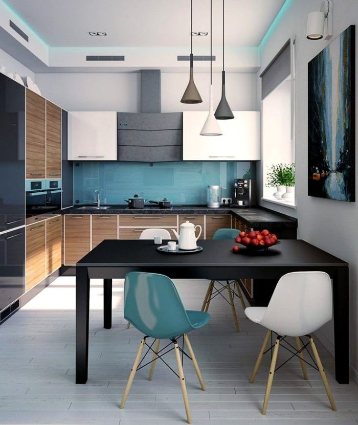 A light blue chair and backsplash in a modern kitchen
