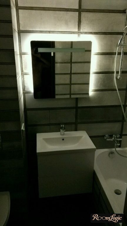 a loft-style bathroom mirror with backlight