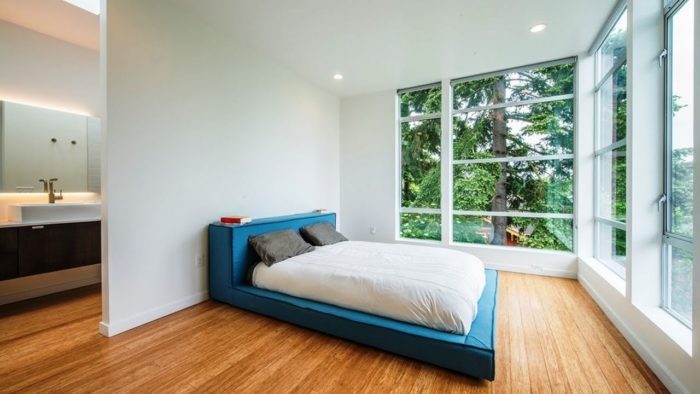 a minimalist bedroom without a door