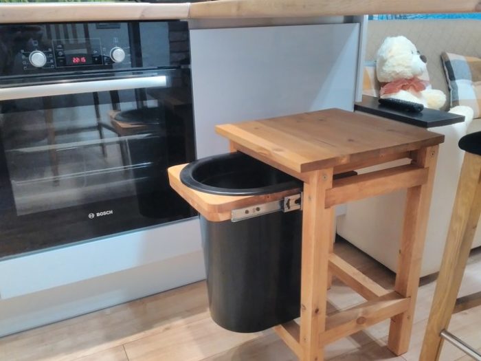 a pull-out trash can stool