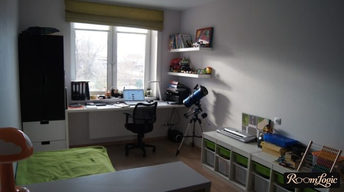 a table by the window for a boy teenager