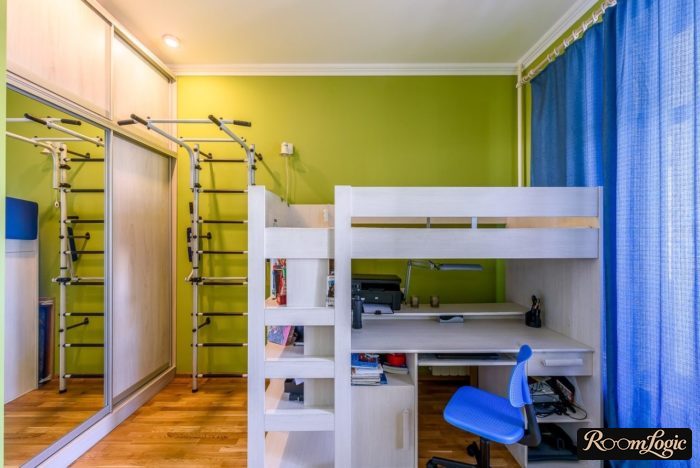 a twin bed, desk, pull-up bar, and closet in a teenager's room