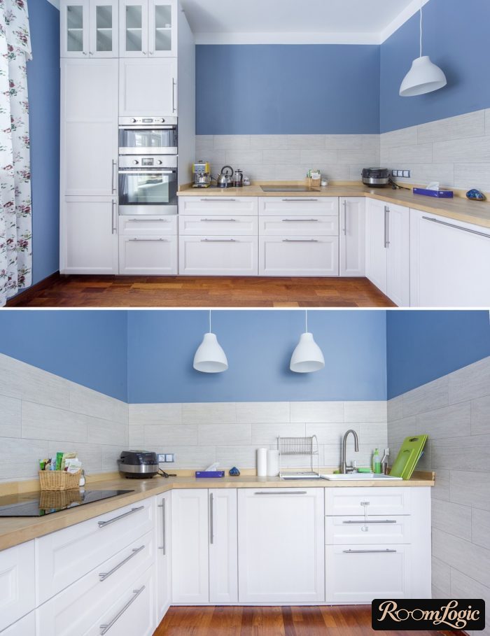 A white kitchen in Scandinavian style without upper cabinets with a light blue wall