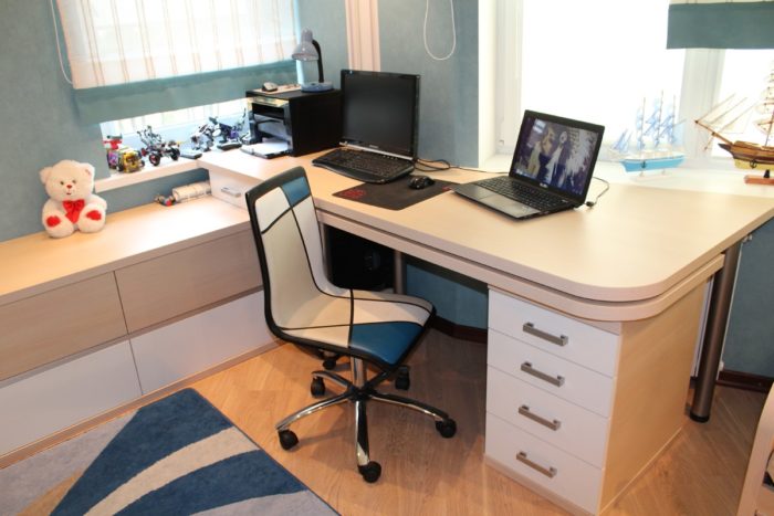 a workspace for two teenagers
