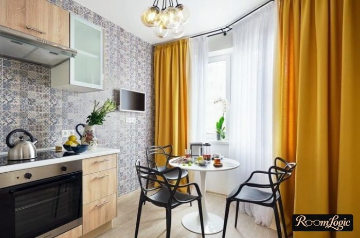 Accent orange curtains in a modern kitchen