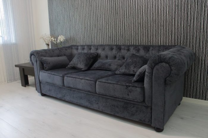 Accent wallpaper behind the sofa in the living room