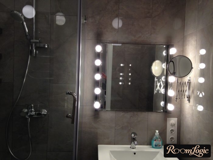 additional lighting in the bathroom of a tiny apartment