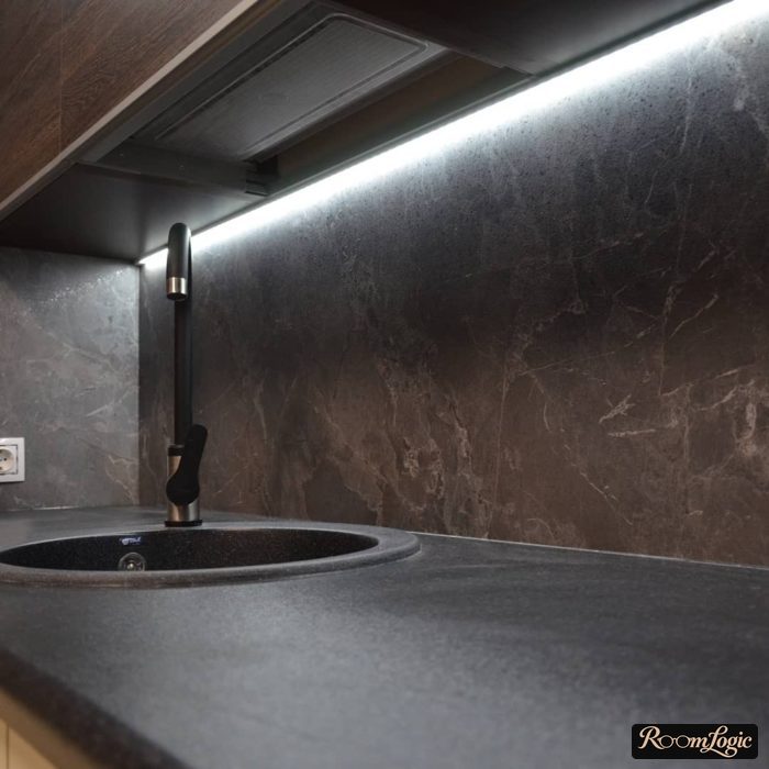 backsplash of marble with lighting in gray kitchen