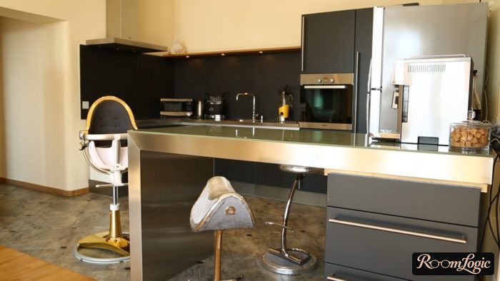 Bar counter made of stainless steel in an industrial style kitchen