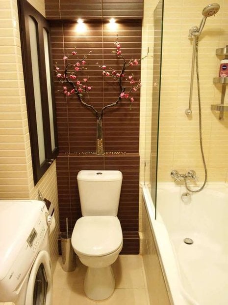bathroom and washer in small apartment