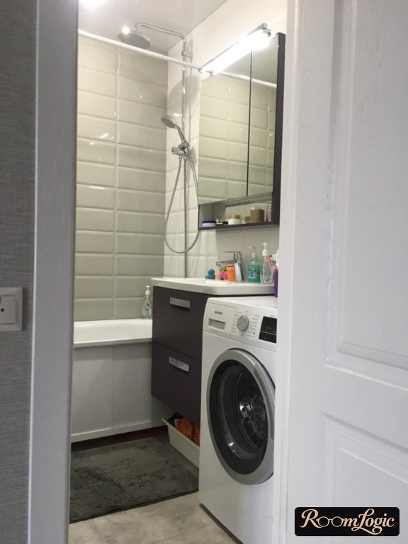 bathroom design in a tiny apartment with a washer