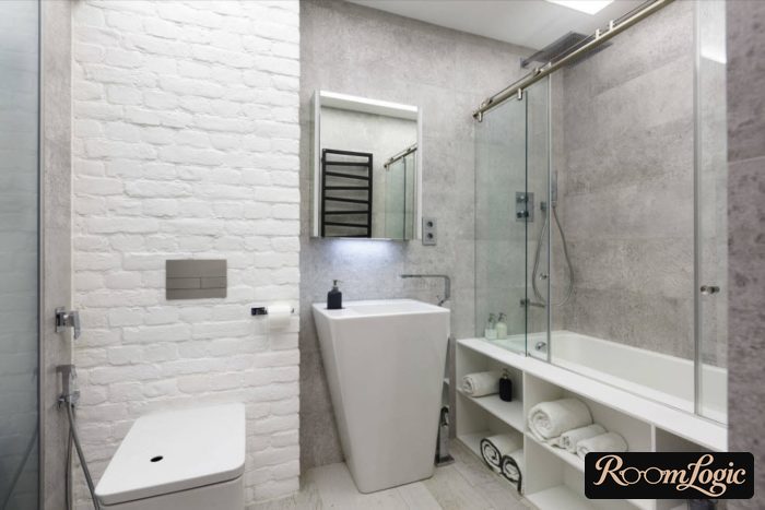 Bathroom in loft style with affordable tile and white bricks