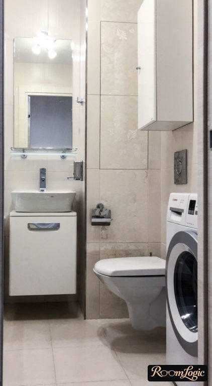 bathroom layout in a tiny apartment with toilet and washer