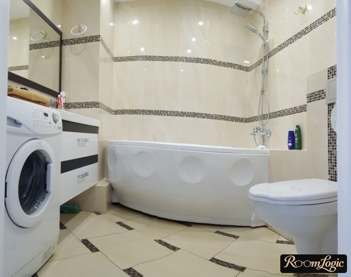 bathroom layout with toilet and washer