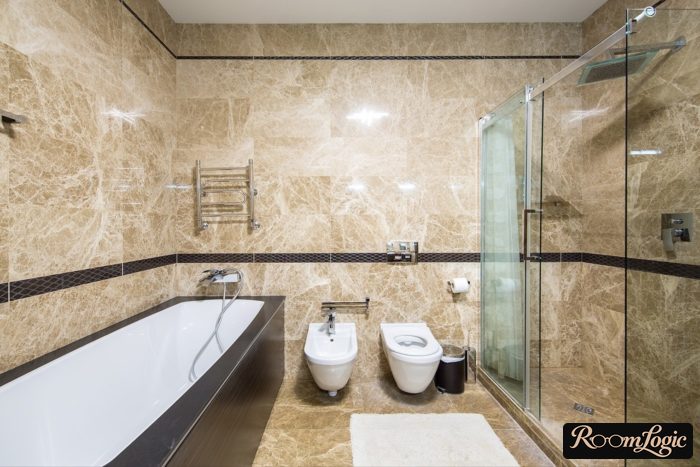 bathroom with bathtub and shower