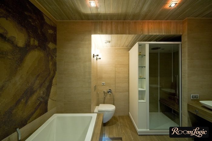 bathroom with shower and wood-look tile