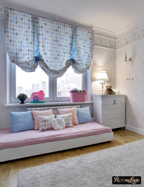 bed on the floor near the window in kids’ room