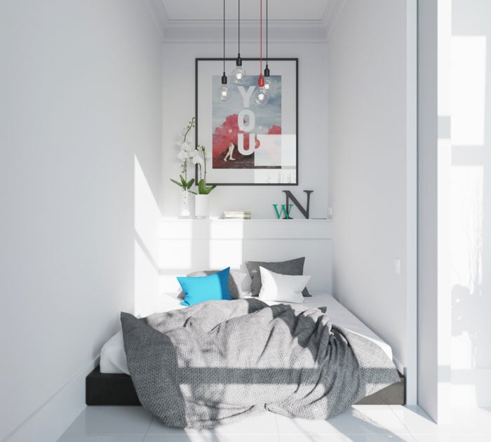 bed spanning from wall to wall in small bedroom