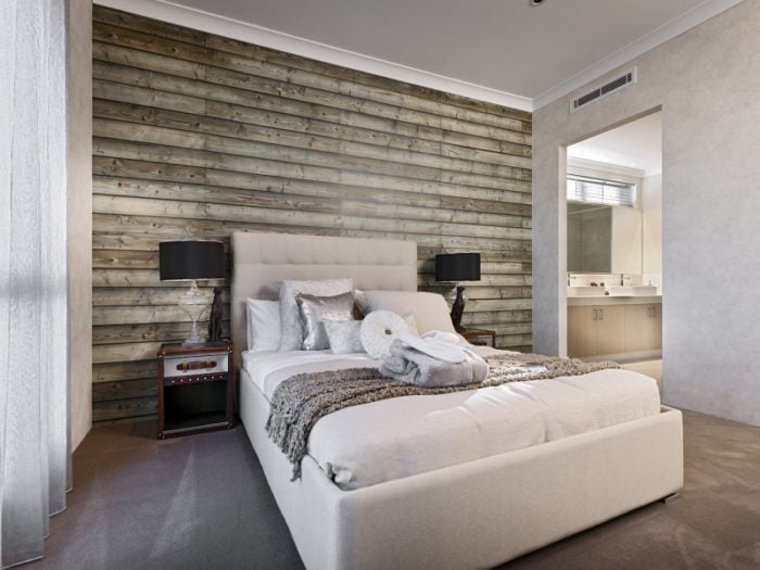 bedroom with wallpaper mimicking wood planks