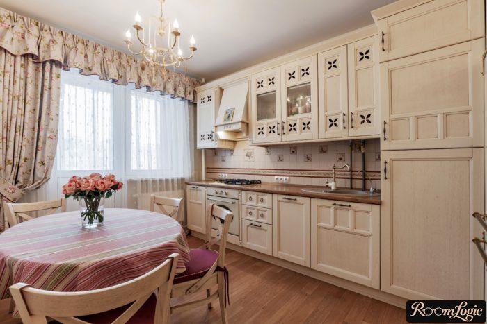Beige curtain with valance in a Provence-style kitchen