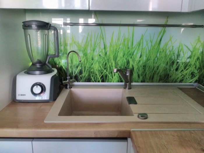 Beige sink on wooden countertop