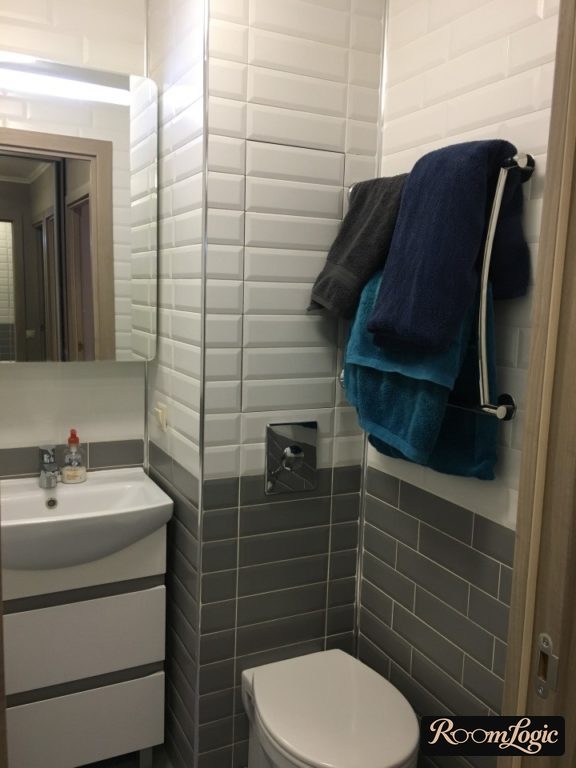 black and white bathroom in a tiny apartment