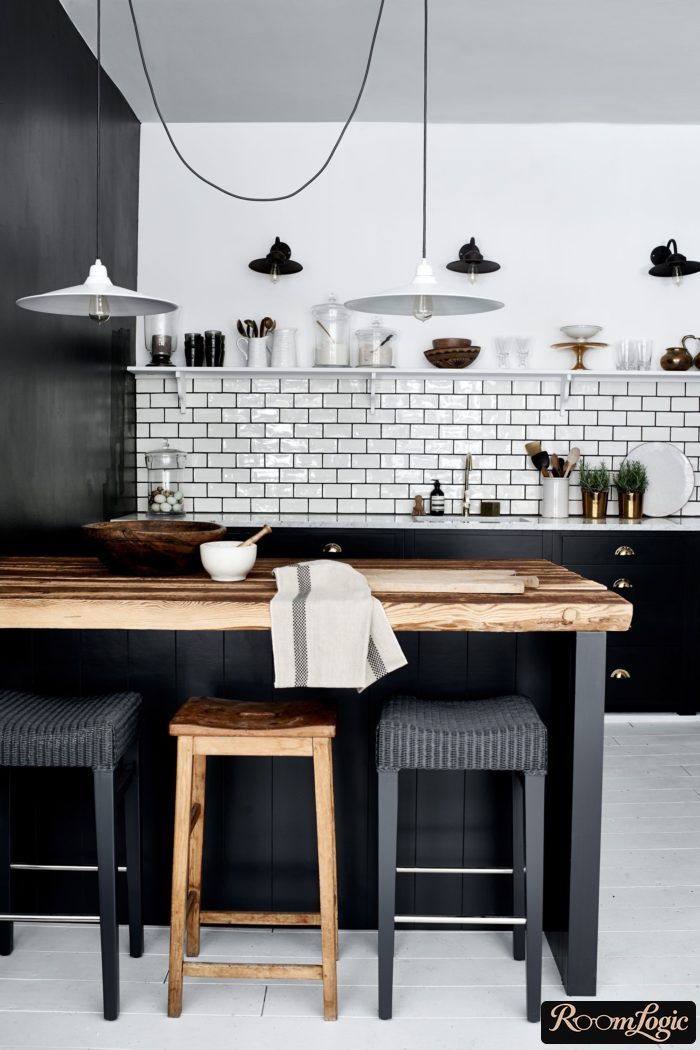 black and white kitchen with bar counter without upper cabinets