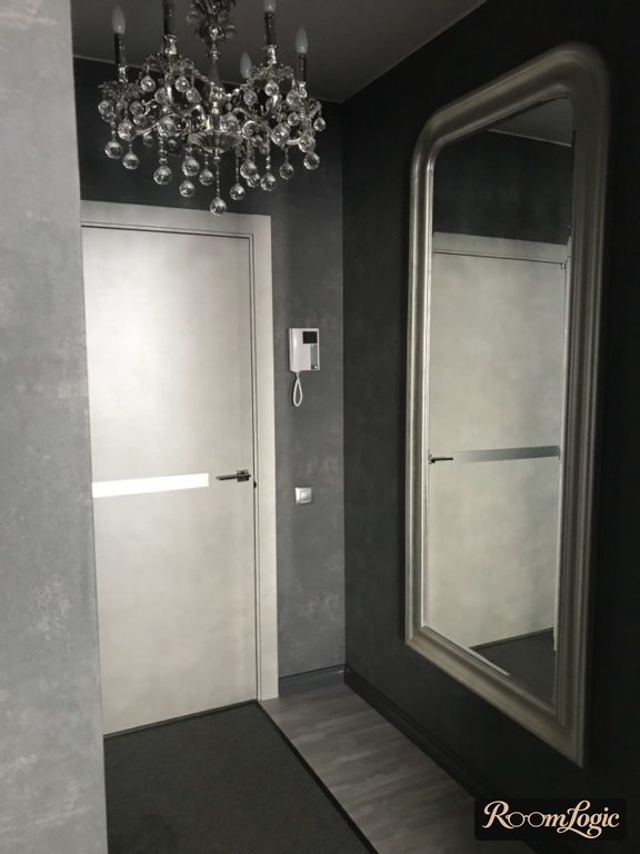 black decorative plaster in the design of a small entryway
