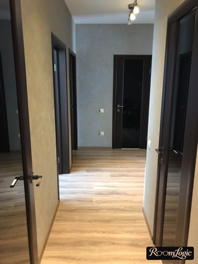 black doors in hallway