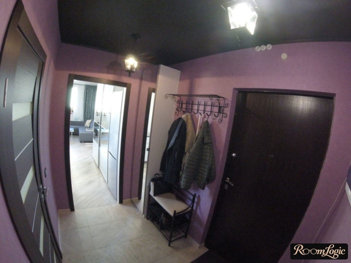 black glossy ceiling in violet entryway