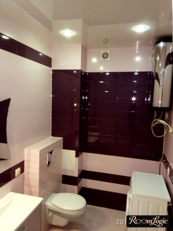 black glossy tile in small bathroom
