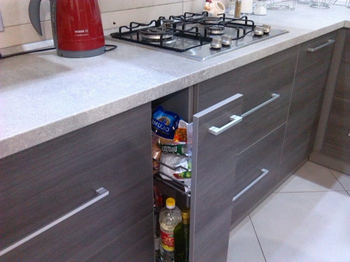 black grout for white tile in the kitchen