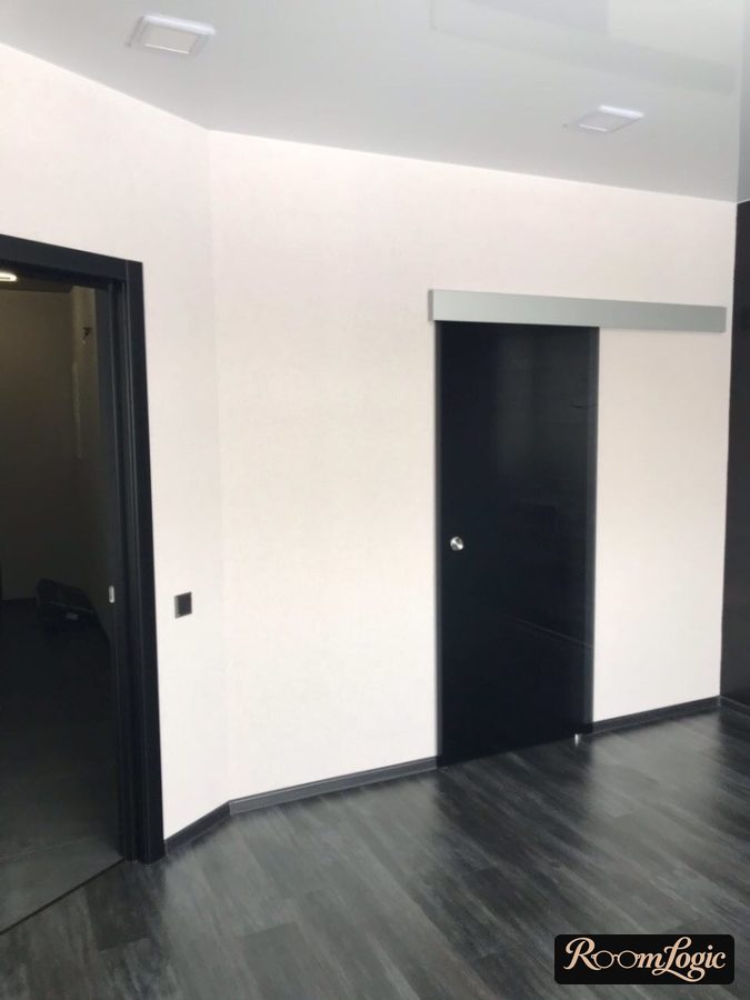 black laminate and sliding doors in hallway