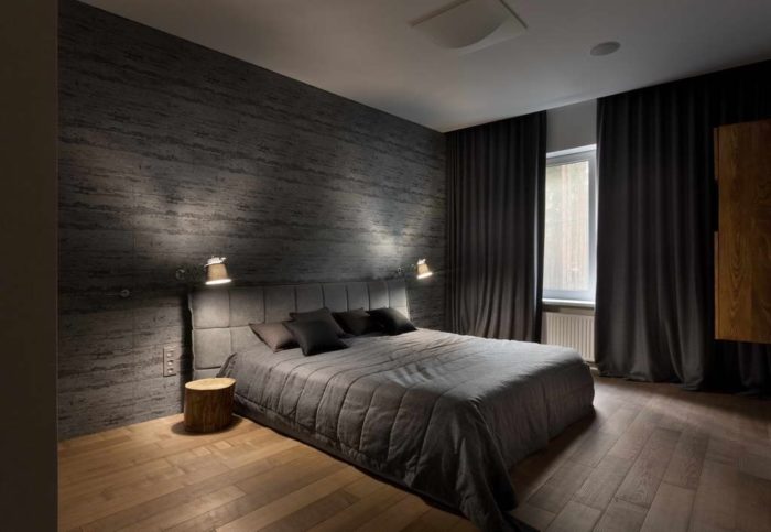 black loft-style wallpaper in the bedroom