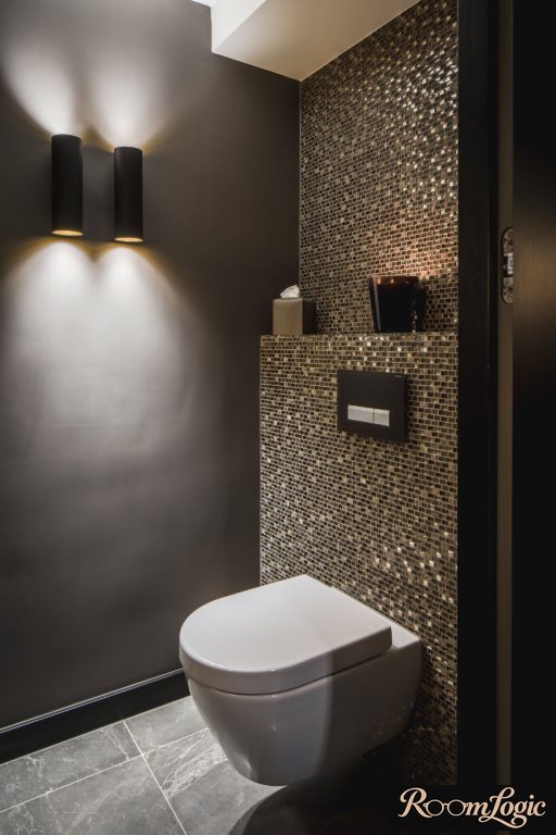 black painted wall with bedside lamp in toilet design