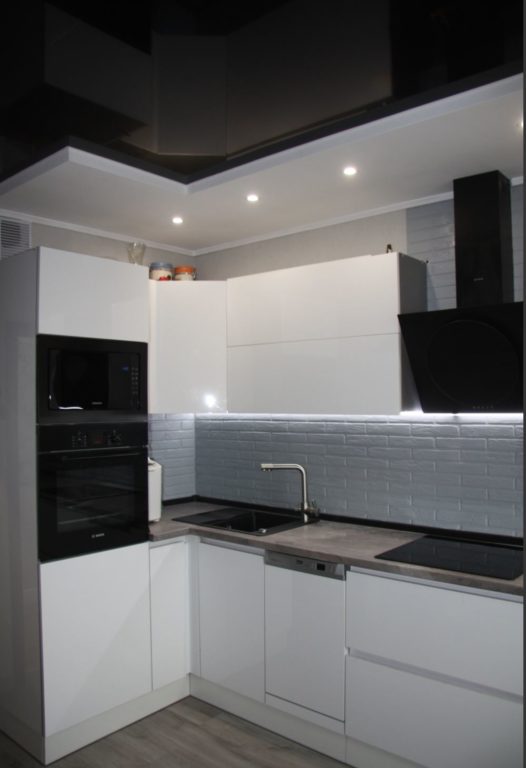 black stretch ceiling in small kitchen