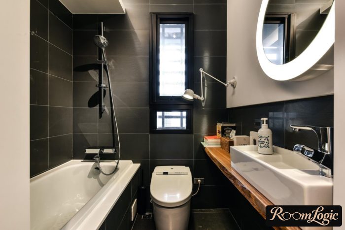 black tile in the bathroom in loft style