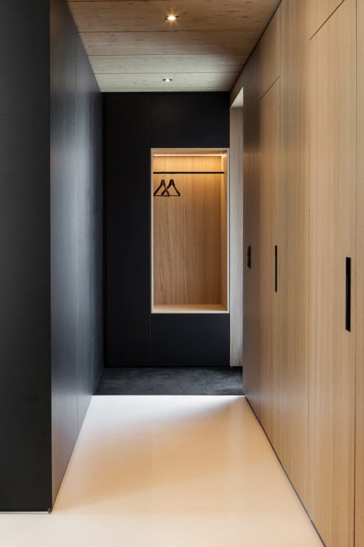 black wall finish in hallway