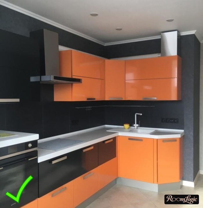 Black washable non-woven wallpaper in an orange kitchen