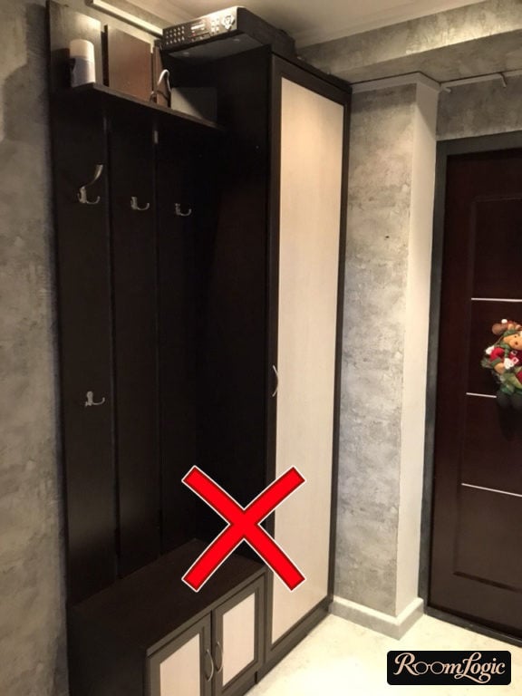 black with wood grain small entryway closet