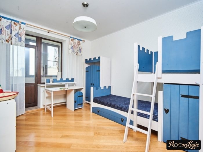 blue and white furniture in a boys' room