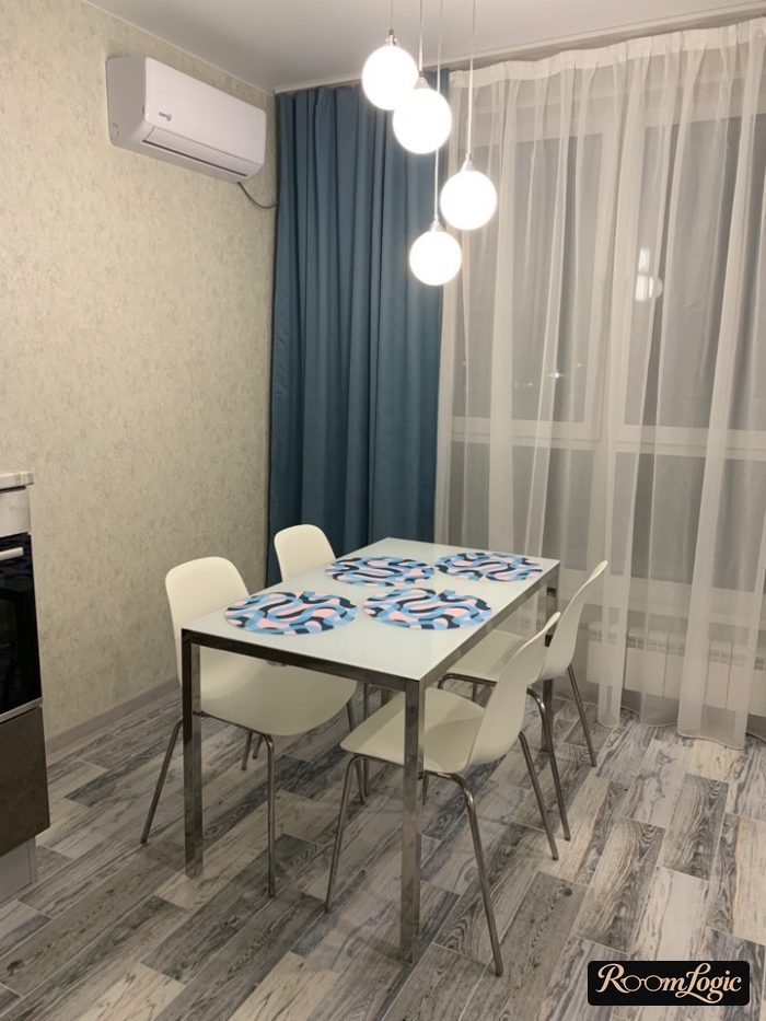 blue curtains in gray kitchen