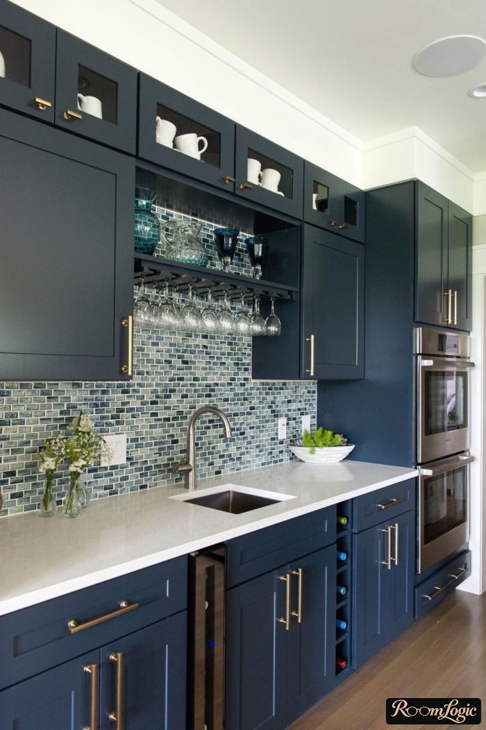 blue kitchen backsplash with mosaic in neoclassical style