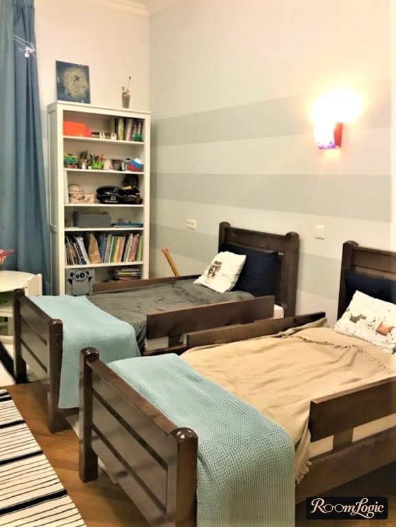 boys' room with brown furniture