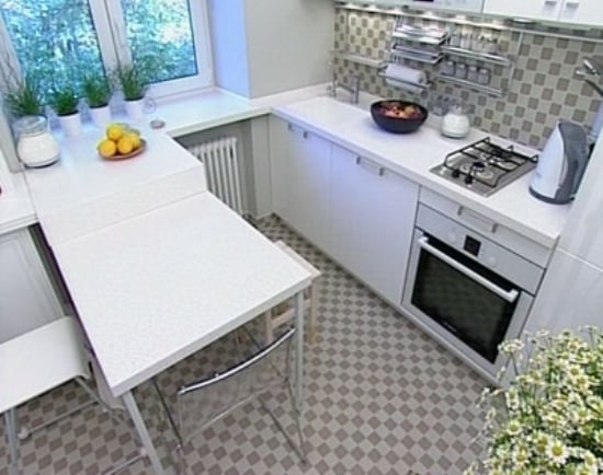 breakfast bar in the kitchen of a tiny apartment