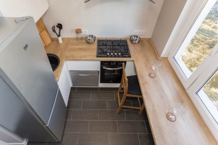 breakfast bar window seat countertop in tiny apartment